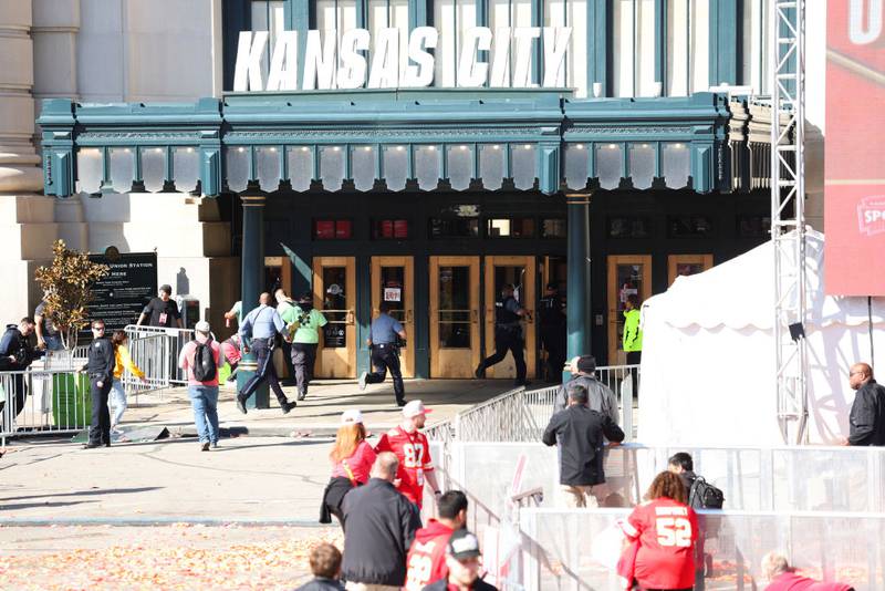 KANSAS CITY, MISSOURI - FEBRUARY 14: Law enforcement and medical personnel respond to a shooting at Union Station during the Kansas City Chiefs Super Bowl LVIII victory parade on February 14, 2024 in Kansas City, Missouri. Several people were shot and two people were detained after a rally celebrating the Chiefs Super Bowl victory. (Photo by Jamie Squire/Getty Images)