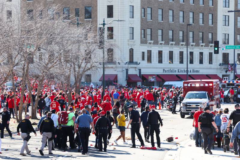 KANSAS CITY, MISSOURI - FEBRUARY 14: Law enforcement and medical personnel respond to a shooting at Union Station during the Kansas City Chiefs Super Bowl LVIII victory parade on February 14, 2024 in Kansas City, Missouri. Several people were shot and two people were detained after a rally celebrating the Chiefs Super Bowl victory. (Photo by Jamie Squire/Getty Images)