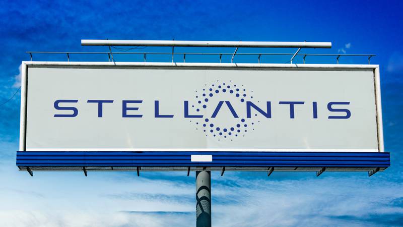 Advertisement billboard displaying logo of Stellantis, a multinational automotive manufacturing corporation formed in 2021.